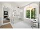 Luxurious bathroom featuring a large walk-in shower and a modern standalone tub at 1084 Wrights Mill Rd, Canton, GA 30115