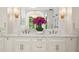 Elegant bathroom with dual sinks, marble countertops, and stylish fixtures at 1084 Wrights Mill Rd, Canton, GA 30115