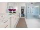 Elegant bathroom with walk-in shower, dual sink vanity, and marble floors at 1084 Wrights Mill Rd, Canton, GA 30115