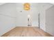 Bright bedroom featuring beautiful hardwood floors and custom wall paneling at 1084 Wrights Mill Rd, Canton, GA 30115