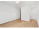 Bright bedroom offers hardwood floors, and detailed trim, creating a bright and welcoming space at 1084 Wrights Mill Rd, Canton, GA 30115