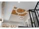Grand coffered ceiling in an open-concept home with a modern light fixture at 1084 Wrights Mill Rd, Canton, GA 30115
