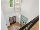 Bright entryway with a chandelier, hardwood floors and double doors leading to outside at 1084 Wrights Mill Rd, Canton, GA 30115