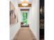 Hallway with light wood floors, a window seat and view of nature at 1084 Wrights Mill Rd, Canton, GA 30115