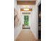 Bright hallway with hardwood floors, natural light, and charming window seat, creating a welcoming and airy atmosphere at 1084 Wrights Mill Rd, Canton, GA 30115