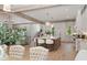 Spacious open kitchen with a large center island with marble countertops and bright lighting at 1084 Wrights Mill Rd, Canton, GA 30115