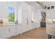 Bright kitchen with custom cabinets, marble countertops, and stainless steel appliances at 1084 Wrights Mill Rd, Canton, GA 30115