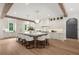 Spacious kitchen with a large island, white cabinets, and modern lighting fixtures at 1084 Wrights Mill Rd, Canton, GA 30115