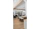 Open floor plan displaying a living room with fireplace visible from the kitchen island at 1084 Wrights Mill Rd, Canton, GA 30115