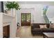 Living room with fireplace and view of the front entrance at 1084 Wrights Mill Rd, Canton, GA 30115
