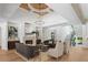 Living room with a fireplace, coffered ceiling, and plenty of natural light at 1084 Wrights Mill Rd, Canton, GA 30115