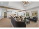 Open-concept living space with kitchen, dining, and living areas at 1084 Wrights Mill Rd, Canton, GA 30115