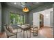 Sophisticated office space with natural light, decorative ceiling, and view to the lawn, perfect for remote work at 1084 Wrights Mill Rd, Canton, GA 30115