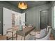 Well-appointed home office featuring sophisticated paint, a decorative ceiling, and seamless transition to other living spaces at 1084 Wrights Mill Rd, Canton, GA 30115
