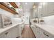 Well-organized pantry with white cabinets, open shelving, and modern fixtures at 1084 Wrights Mill Rd, Canton, GA 30115