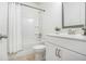 Clean bathroom features white cabinets, a framed mirror, and a shower with curtain at 308 Evening Rain Crst, Canton, GA 30114