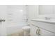 Bathroom featuring tile floor, shower-tub combo, and modern vanity with solid surface countertops at 308 Evening Rain Crst, Canton, GA 30114