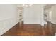 Formal dining room featuring hardwood floors, wainscoting, and elegant lighting at 308 Evening Rain Crst, Canton, GA 30114
