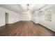 Open living room featuring hardwood floors, mini-split AC, and recessed lighting at 308 Evening Rain Crst, Canton, GA 30114