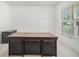 Home office featuring a large dark wooden desk and a bright window with natural light at 308 Evening Rain Crst, Canton, GA 30114