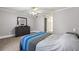 Cozy bedroom with soft carpet, soothing colors, a ceiling fan and ample space, perfect for relaxation and rest at 516 Summit North Ne Dr, Atlanta, GA 30324
