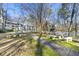 Charming community area with stone benches and a gazebo, nestled among mature trees at 516 Summit North Ne Dr, Atlanta, GA 30324