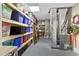 Finished basement with ample storage shelving and mechanical systems neatly arranged at 5360 Franklin Goldmine Rd, Cumming, GA 30028