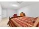 Spacious bedroom featuring a bed, dresser, and recliner at 5360 Franklin Goldmine Rd, Cumming, GA 30028
