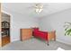 Cozy bedroom with natural light, a ceiling fan and carpet at 5360 Franklin Goldmine Rd, Cumming, GA 30028