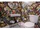 Charming powder room with vibrant floral wallpaper and elegant fixtures at 970 Winding Creek Trl, Sandy Springs, GA 30328