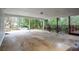 Large carport with concrete floor and wood supports at 970 Winding Creek Trl, Sandy Springs, GA 30328