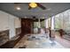 Expansive covered patio with wood accents, offering an ideal space for outdoor entertaining at 970 Winding Creek Trl, Sandy Springs, GA 30328