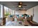 Comfortable staged patio with cozy seating and stone accents, creating an outdoor living space at 970 Winding Creek Trl, Sandy Springs, GA 30328