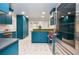 Bright kitchen features custom cabinets, a geometric tiled floor, and stainless steel appliances at 970 Winding Creek Trl, Sandy Springs, GA 30328