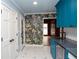 Open kitchen with custom cabinets, geometric tile floor, and sleek countertops at 970 Winding Creek Trl, Sandy Springs, GA 30328