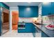 Updated eat-in kitchen with stainless steel appliances and blue cabinets at 970 Winding Creek Trl, Sandy Springs, GA 30328