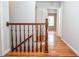 Staircase featuring hardwood floors and natural light at 970 Winding Creek Trl, Sandy Springs, GA 30328