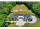 Overhead shot of luxury home with large lot shows the scale of the property at 2305 Braselton Hwy, Buford, GA 30519