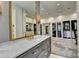 Bathroom featuring a large vanity and mirror, and access to the walk-in closet at 2305 Braselton Hwy, Buford, GA 30519