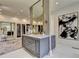 Bathroom featuring a large vanity and mirror, and access to the walk-in closet at 2305 Braselton Hwy, Buford, GA 30519