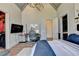 A well-appointed bedroom with a desk, closet, ensuite, and stylish decor at 2305 Braselton Hwy, Buford, GA 30519