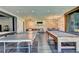 Large game room with pool table, ping pong, media area, and a modern design at 2305 Braselton Hwy, Buford, GA 30519