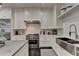 Kitchen with stainless steel range and sink and lots of storage at 2305 Braselton Hwy, Buford, GA 30519