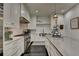 Eat in kitchen with stainless steel oven and range and white cabinets at 2305 Braselton Hwy, Buford, GA 30519