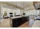 Spacious gourmet kitchen with a large center island and stainless steel appliances at 2305 Braselton Hwy, Buford, GA 30519