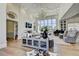Elegant living room with coffered ceilings, large windows, hardwood floors, and stylish decor at 2305 Braselton Hwy, Buford, GA 30519