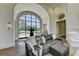 Living room featuring a large window, comfortable seating, and stylish decor at 2305 Braselton Hwy, Buford, GA 30519