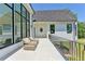 Spacious patio overlooking the property, featuring stone flooring and comfortable outdoor seating at 2305 Braselton Hwy, Buford, GA 30519