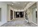 Large walk-in closet with custom storage, carpeting, lighting, and a mannequin at 2305 Braselton Hwy, Buford, GA 30519