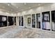 Spacious walk-in closet with custom shelving and storage options for organizing clothes and accessories at 2305 Braselton Hwy, Buford, GA 30519